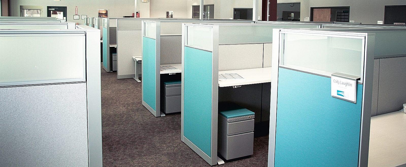 Edgewater Automation's office area with blue cubicles.