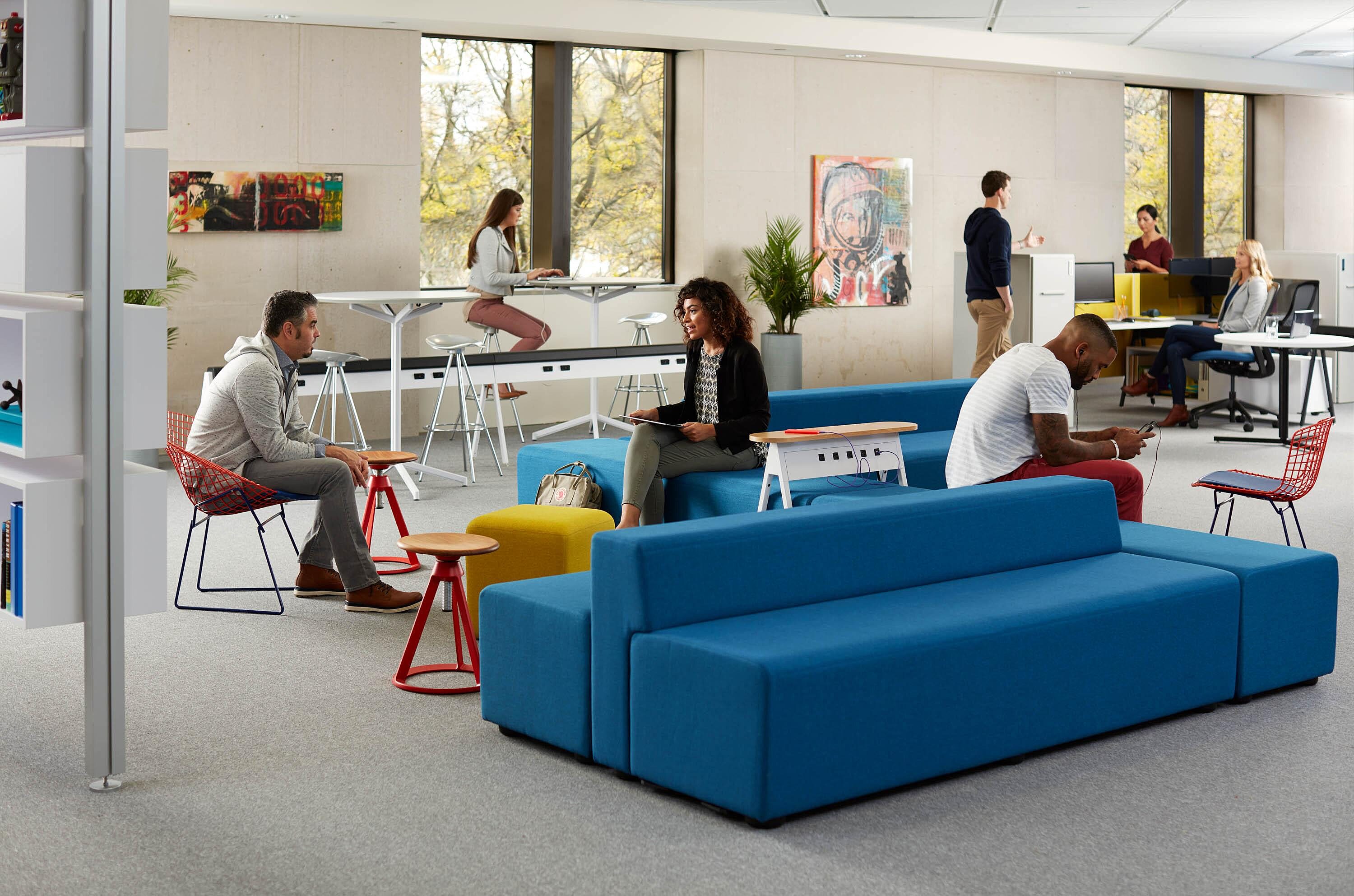 Employees in an open, sustainable office.